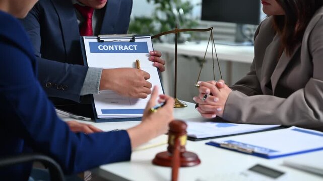 Business law concept, Lawyer business lawyers are consulting lawyers for women entrepreneurs to file copyright lawsuit with laptop and tablet