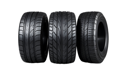 Three black car tires isolated on a transparent background