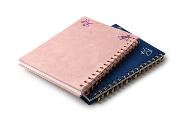 Different notebooks and clips on white background