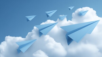 Blue paper airplanes flying through a bright blue sky with soft clouds.