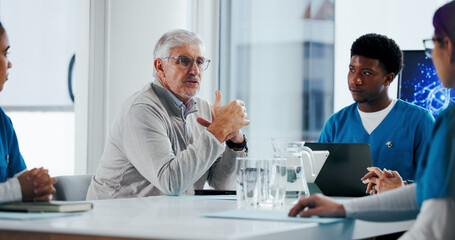 Man, medical director and meeting with team for clinic funding, discussion or improvement. Mature, male person or CEO of healthcare group in conference for proposal, budget or development in hospital