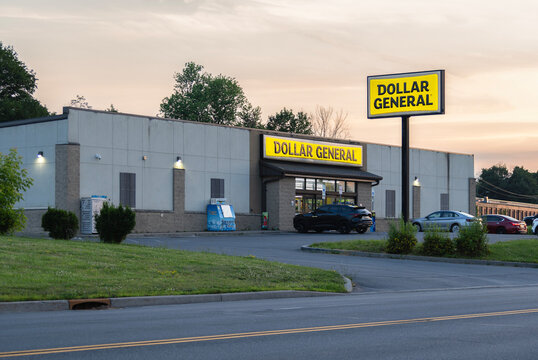 Utica, NY - Jul 5, 2025: Twilight wide view of Dollar General store, is a popular discount retailer providing a wide range of everyday essentials, was established in 1939 with over 18000 now