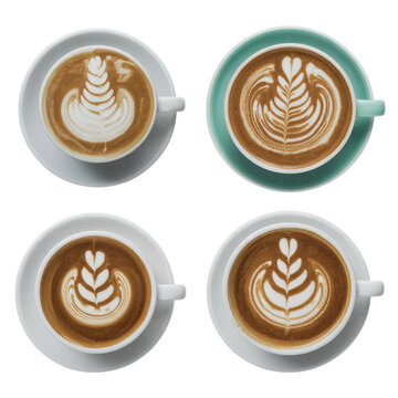 Four cups of latte art, two in white cups and two in teal cups, shown from overhead view. background removed