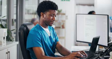 Man, nurse and typing with laptop for online booking, administration or medical appointment. Male...