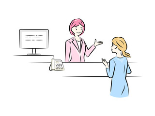 受付カウンターで接客をするビジネスウーマン｜ビジネスシーン