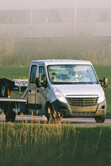 Heavy-duty wrecker truck on rural highway