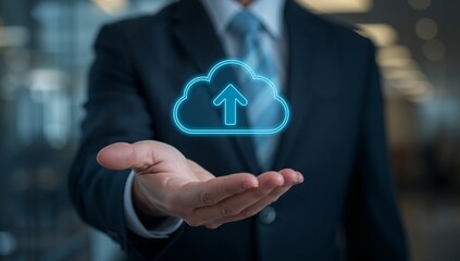 Business professional holds a glowing cloud with a network arrow