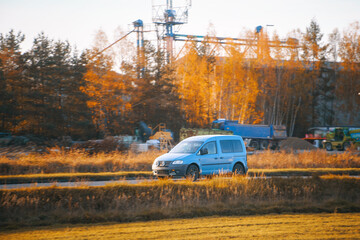 Car cruising in natural rural setting