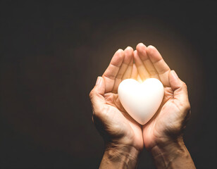 Obraz premium Cupped hands holding a white, heart-shaped object, a symbol of care and love. Generative AI