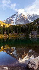 Mountain lake reflection, autumn sunrise
