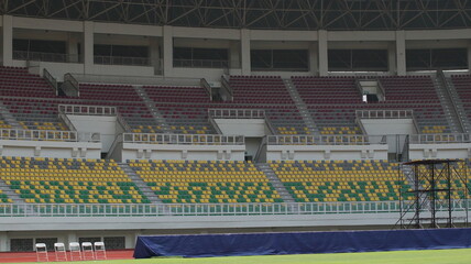 empty stands in a football stadium with no spectators
