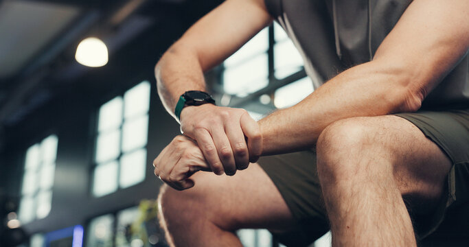 Hands, wrist pain and man in gym, training or fibromyalgia with carpal tunnel syndrome. Closeup, health center or person with workout, osteoporosis or joint injury with muscle tension or inflammation