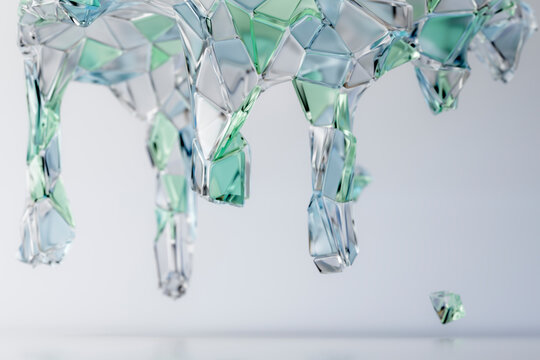 Abstract glass geometric 3D sculpture with blue and green shapes