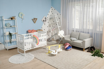 Interior of messy children's room with overturned furniture after earthquake