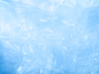 Obraz premium Abstract background plastic bag blue vacuum cling foil wrinkle texture wall crumpled film foil overlay seal wrap polyethyene packaging frame material industry wrinkle template ecosystem environment