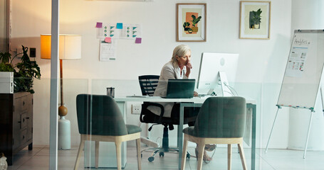 Business, thinking and woman in office, computer and online reading with profit growth. Mature person, accounting and employee with PC, decision and research for trading, problem solving and email