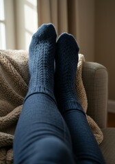Relaxed Feet in Blue Socks and Cozy Blanket