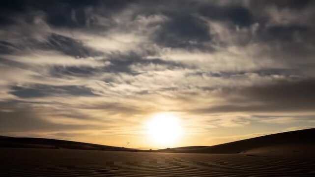 Desert Sunset: A breathtaking depiction of a desert landscape bathed in the golden embrace of sunset, as the sun dips below the horizon, casting long shadows and painting the sky with fiery hues.