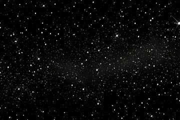 A vast expanse of night sky, densely populated with twinkling stars. A faint, streaky nebula is visible across the image