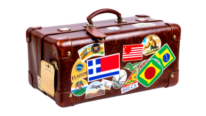 A vintage brown suitcase adorned with travel stickers from various countries and destinations shown