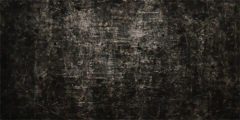 Dark and gritty, this black and white grunge background features an old, textured wall with a rough, dirty surface