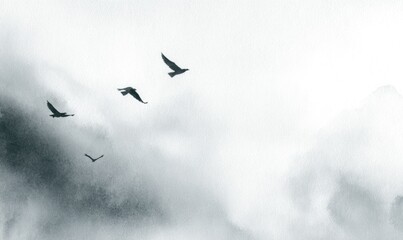 Three birds soar through a misty, gray landscape