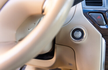 Action of driver finger is pressing on the start button to starting the car engine. Engine Start...