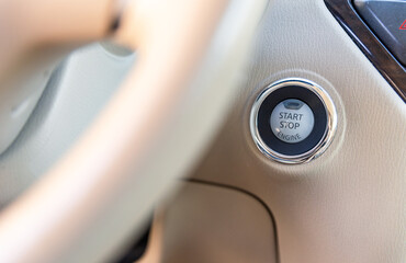 Action of driver finger is pressing on the start button to starting the car engine. Engine Start...