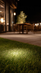 Obraz premium Night view of patio with LED lights and outdoor seating area