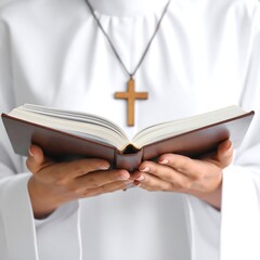 Person holding open book