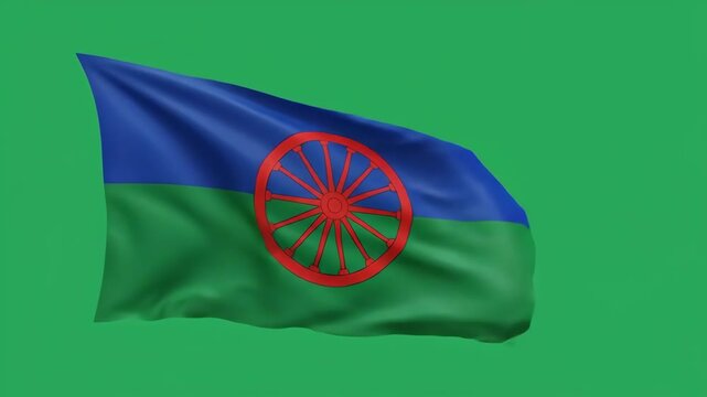 The international flag of the romani people with its blue and green background and a red chakra is waving in the wind against a green screen