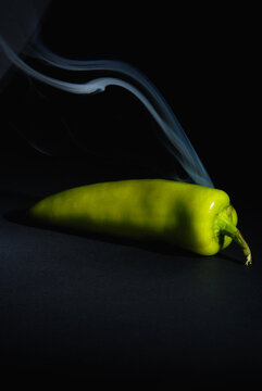 Sri lankan Fresh Hot and Smoky Green Capsicum (Chili Pepper) isolated on Black Background &ndash; Spicy Food Concept