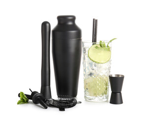 Shaker, muddler, measure cup, strainer and glass with cocktail isolated on white background