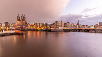 Fototapeta premium Amsterdam canal at night in Holland on june 10th 2025