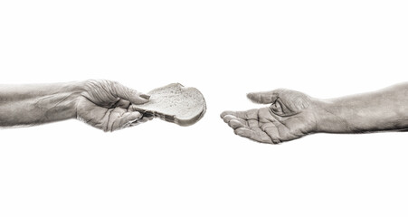 Old man giving poor homeless person pieces of bread. Helping the homeless. Elder woman hand give a...