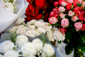 Red and white roses in beautiful bouquets, the beauty of flowers 
