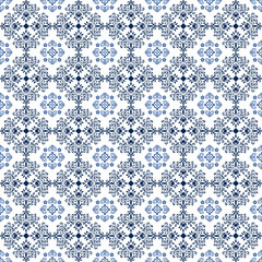 Seamless floral vector pattern in indigo tones for textile and wallpaper design.