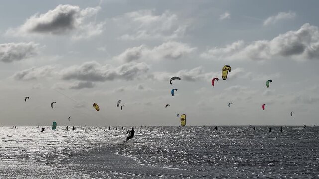 Kitesurfer Silhouette Multiple Colorful Kites Contrails Sparkling Ocean Brouwersdam Netherlands