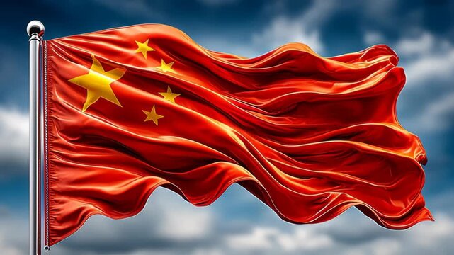 A waving flag of China with five yellow stars on a red background. The flag is set against a blue sky with clouds.