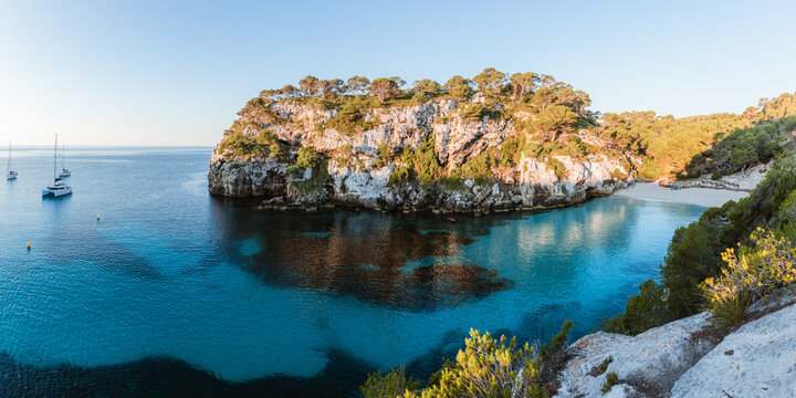 Panoramic of Cala Macarelleta at sunrise, Spain