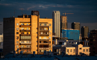 Multi-storey residential buildings at sunset in the center of the Russian capital.