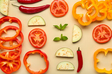 Composition with fresh vegetables and mint leaves on beige background, closeup