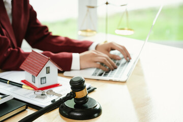 A wooden gavel symbolizes law, justice, and authority in the courtroom, representing judgement, legal decisions, contracts, property disputes, real estate auctions, punishment, government, and busines