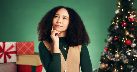 Christmas, thinking and vision with woman in studio for decision, wish list or holiday season....