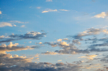Beautiful storm clouds on a summer night with pinks and blues.
