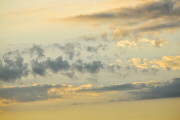 Beautiful storm clouds on a summer night with pinks and blues.