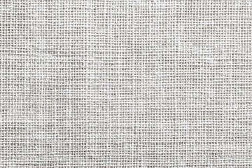 Close-up of a plain, light beige linen fabric