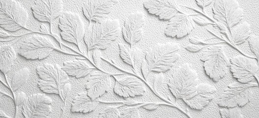 White textured surface with embossed leaf patterns (1)