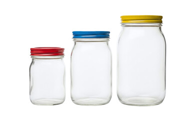 Three empty glass jars with colorful lids