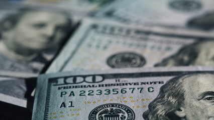 Detail shot hundred dollar notes arranged neatly. Printed paper money surface